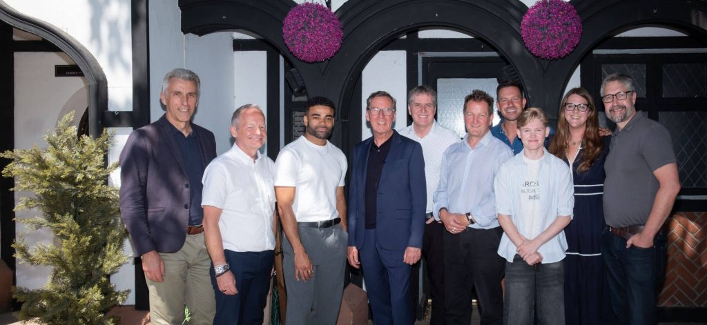 Alan Milburn, Steve Rotheram, Malique Thompson-Dwyer, John McLachlan, Jon Sparkes, Leo Cole, Ashley Taylor-Dawson, Hannah Cheers, John Whittle outside Hollyoaks The Dog pub