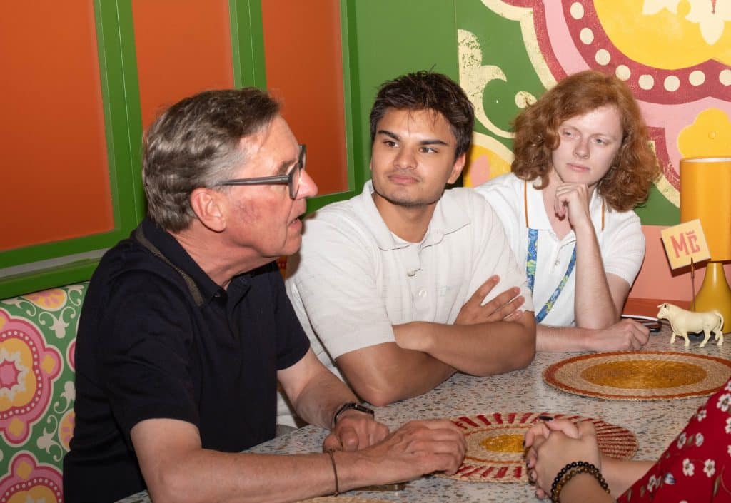 Alan Milburn, Saleem Miah and Aslan Herzen in conversation on the set of Hollyoaks